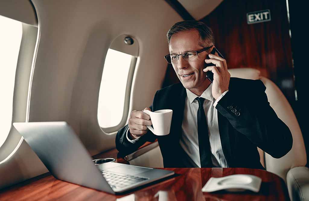●A businessman on board a private jet