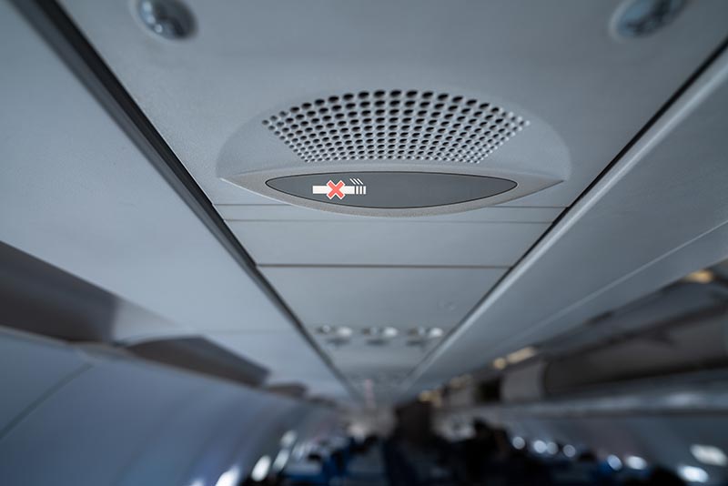 No smoking sign in commercial airplane