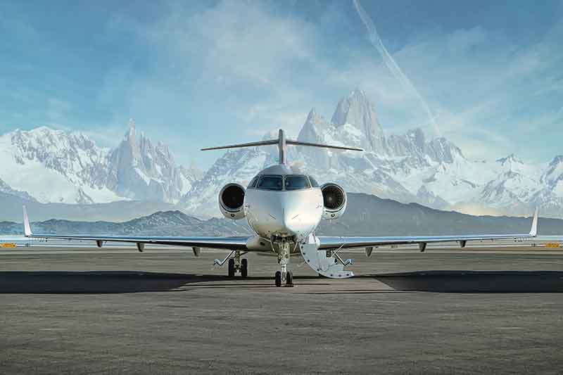 Private jet on the tarmac in the mountains
